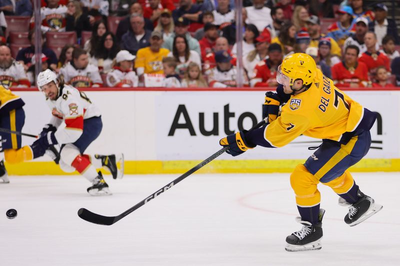 Mar 21, 2024; Sunrise, Florida, USA; Nashville Predators defenseman Marc Del Gaizo (7) shoots the puck against the Florida Panthers during the second period at Amerant Bank Arena. Mandatory Credit: Sam Navarro-USA TODAY Sports