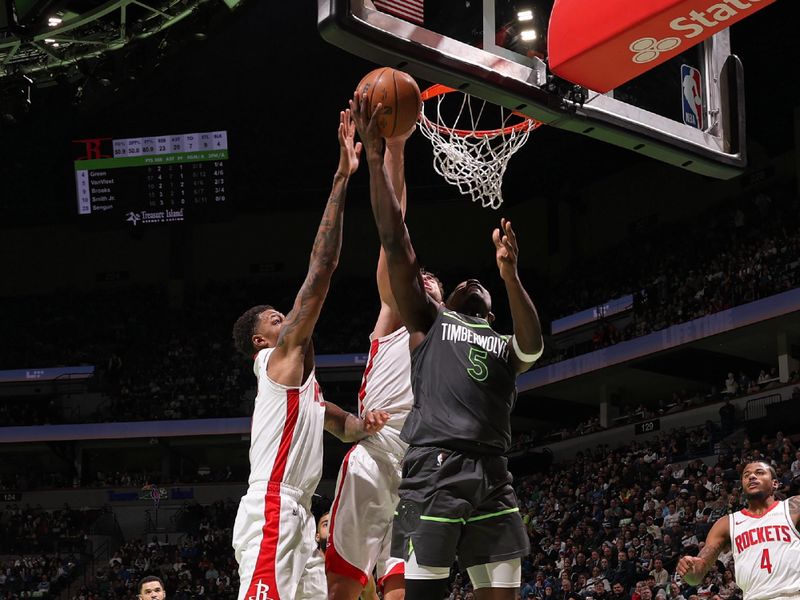 MINNEAPOLIS, MN -  NOVEMBER 26: Anthony Edwards #5 of the Minnesota Timberwolves drives to the basket during the game against the Houston Rockets during the Emirates NBA Cup game on November 26, 2024 at Target Center in Minneapolis, Minnesota. NOTE TO USER: User expressly acknowledges and agrees that, by downloading and or using this Photograph, user is consenting to the terms and conditions of the Getty Images License Agreement. Mandatory Copyright Notice: Copyright 2024 NBAE (Photo by David Sherman/NBAE via Getty Images)