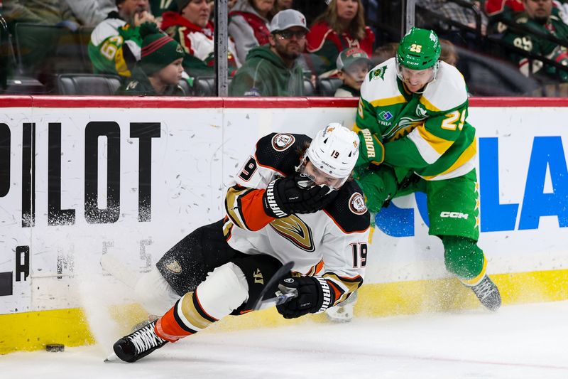 Jan 27, 2024; Saint Paul, Minnesota, USA; Anaheim Ducks right wing Troy Terry (19) reacts after taking Minnesota Wild defenseman Jonas Brodin's (25) stick to the face during the second period at Xcel Energy Center. Brodin was charged with a high sticking penalty. Mandatory Credit: Matt Krohn-USA TODAY Sports