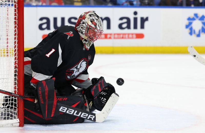 Mar 3, 2024; Buffalo, New York, USA;  Buffalo Sabres goaltender Ukko-Pekka Luukkonen (1) makes a save during the third period against the Winnipeg Jets at KeyBank Center. Mandatory Credit: Timothy T. Ludwig-USA TODAY Sports