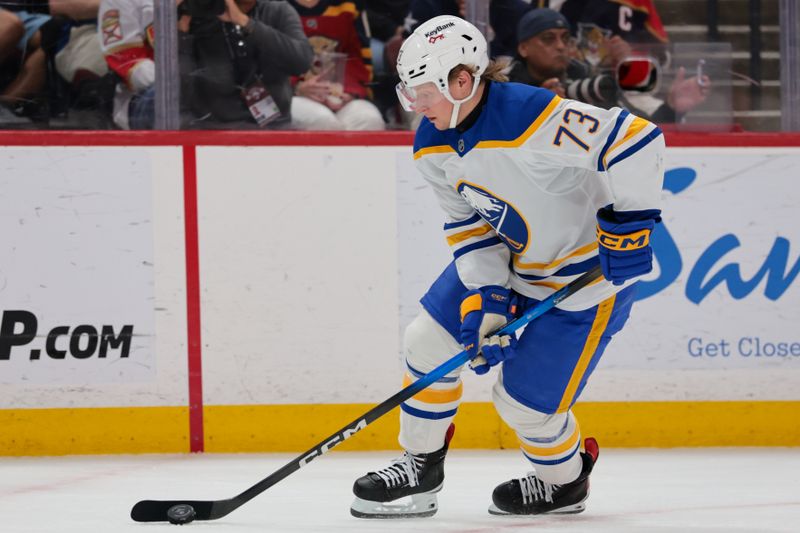 Feb 27, 2026; Sunrise, Florida, USA; Buffalo Sabres defenseman Zach Metsa (73) moves the puck against the Florida Panthers during the second period at Amerant Bank Arena. Mandatory Credit: Sam Navarro-Imagn Images