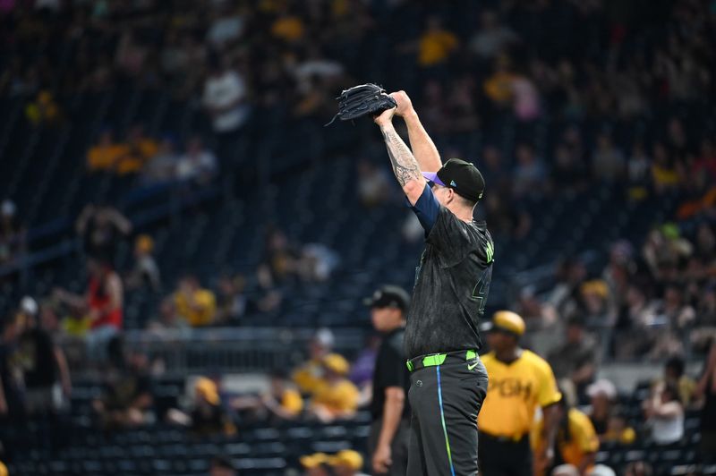 Jun 21, 2024; Pittsburgh, Pennsylvania, USA; Tampa Bay Rays closer Chris Devenski (48) celebrates a 10-3 win over the Pittsburgh Pirates at PNC Park. Mandatory Credit: Philip G. Pavely-USA TODAY Sports