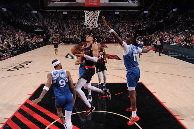 PORTLAND, OR - FEBRUARY 15: Dalano Banton #5 of the Portland Trail Blazers drives to the basket during the game against the Minnesota Timberwolves on February 15, 2024 at the Moda Center Arena in Portland, Oregon. NOTE TO USER: User expressly acknowledges and agrees that, by downloading and or using this photograph, user is consenting to the terms and conditions of the Getty Images License Agreement. Mandatory Copyright Notice: Copyright 2024 NBAE (Photo by Cameron Browne/NBAE via Getty Images)