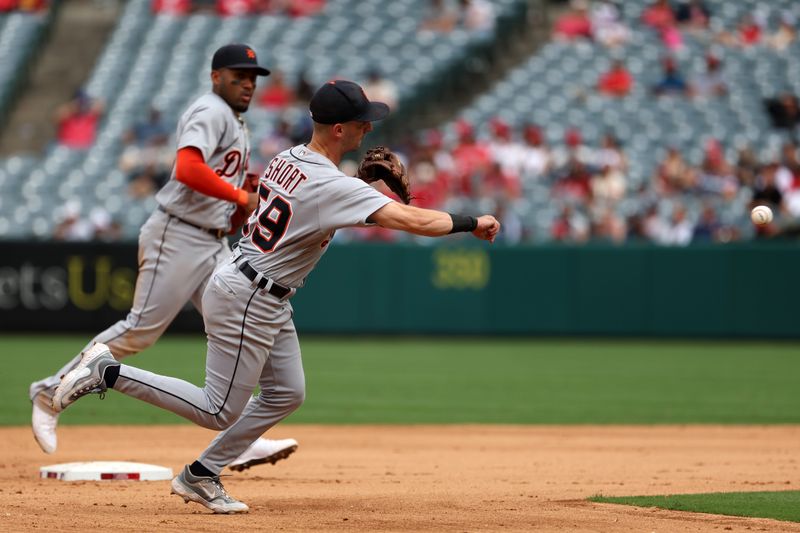 Sep 17, 2023; Anaheim, California, USA;  Detroit Tigers shortstop Zack Short (59) throws a ball to first during the MLB game against the Los Angeles Angels at Angel Stadium. Mandatory Credit: Kiyoshi Mio-USA TODAY Sports