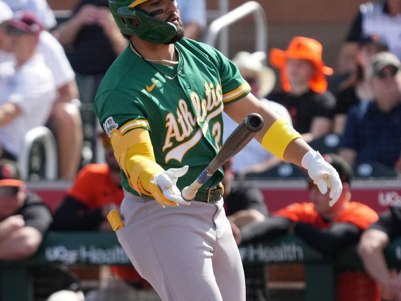 Feb 23, 2026; Scottsdale, Arizona, USA; Athletics left fielder Carlos Cortes (26) draws a walk against the San Francisco Giants in the first inning at Scottsdale Stadium. Mandatory Credit: Rick Scuteri-Imagn Images