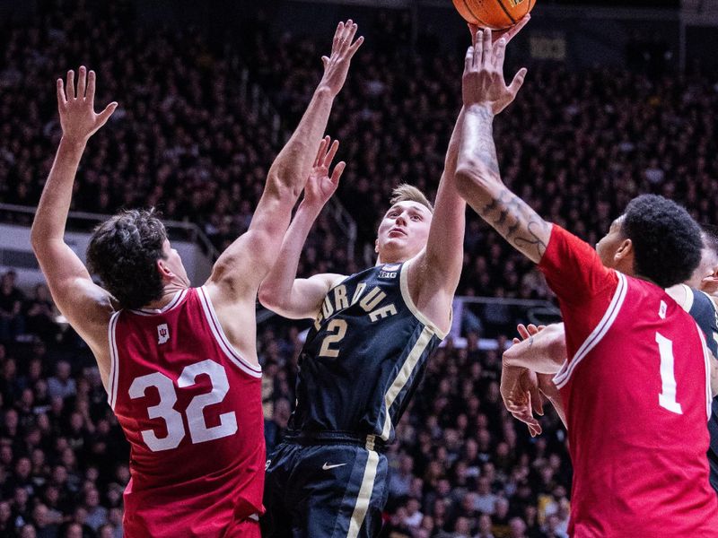 Feb 10, 2024; West Lafayette, Indiana, USA; Purdue Boilermakers guard Fletcher Loyer (2) shoots the ball while Indiana Hoosiers guard Trey Galloway (32) defends in the second half at Mackey Arena. Mandatory Credit: Trevor Ruszkowski-USA TODAY Sports