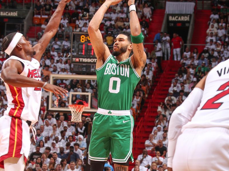 MIAMI, FL - MAY 19:  Jayson Tatum #0 of the Boston Celtics shoots the ball during the game  during round 3 game 4 of the Eastern Conference Finals 2023 NBA Playoffs on May 19, 2023 at the Kaseya Center Arena in Miami, Florida. NOTE TO USER: User expressly acknowledges and agrees that, by downloading and or using this Photograph, user is consenting to the terms and conditions of the Getty Images License Agreement. Mandatory Copyright Notice: Copyright 2023 NBAE (Photo by Issac Baldizon/NBAE via Getty Images)