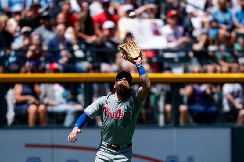 May 26, 2024; Denver, Colorado, USA; Philadelphia Phillies left fielder Brandon Marsh (16) makes a catch in the second inning against the Colorado Rockies at Coors Field. Mandatory Credit: Isaiah J. Downing-USA TODAY Sports