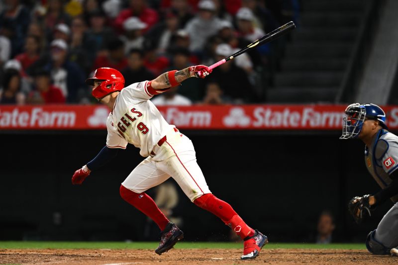 May 11, 2024; Anaheim, California, USA; Los Angeles Angels shortstop Zach Neto (9) singles against the Kansas City Royals during the seventh inning at Angel Stadium. Mandatory Credit: Jonathan Hui-USA TODAY Sports