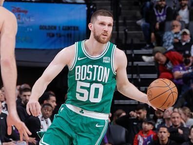 SACRAMENTO, CA - DECEMBER 20:  Svi Mykhailiuk #50 of the Boston Celtics handles the ball during the game  on December 20, 2023 at Golden 1 Center in Sacramento, California. NOTE TO USER: User expressly acknowledges and agrees that, by downloading and or using this Photograph, user is consenting to the terms and conditions of the Getty Images License Agreement. Mandatory Copyright Notice: Copyright 2023 NBAE (Photo by Rocky Widner/NBAE via Getty Images)