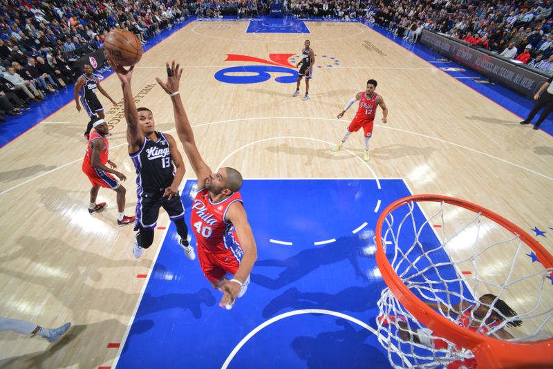 PHILADELPHIA, PA - JANUARY 12:  Keegan Murray #13 of the Sacramento Kings goes to the basket during the game on January 12, 2024 at the Wells Fargo Center in Philadelphia, Pennsylvania NOTE TO USER: User expressly acknowledges and agrees that, by downloading and/or using this Photograph, user is consenting to the terms and conditions of the Getty Images License Agreement. Mandatory Copyright Notice: Copyright 2024 NBAE (Photo by Jesse D. Garrabrant/NBAE via Getty Images)