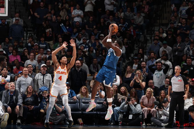 MINNEAPOLIS, MN -  APRIL 12: Anthony Edwards #5 of the Minnesota Timberwolves shoots the ball during the game against the Atlanta Hawks on April 12, 2024 at Target Center in Minneapolis, Minnesota. NOTE TO USER: User expressly acknowledges and agrees that, by downloading and or using this Photograph, user is consenting to the terms and conditions of the Getty Images License Agreement. Mandatory Copyright Notice: Copyright 2024 NBAE (Photo by David Sherman/NBAE via Getty Images)