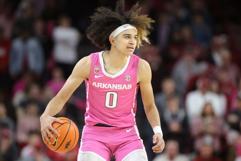 Jan 24, 2023; Fayetteville, Arkansas, USA; Arkansas Razorbacks guard Anthony Black (0) brings the ball up again the LSU Tigers during the first half at Bud Walton Arena. Mandatory Credit: Nelson Chenault-USA TODAY Sports