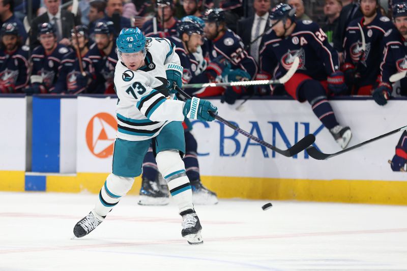 Jan 16, 2025; Columbus, Ohio, USA;  San Jose Sharks center Tyler Toffoli (73) shoots the puck during the second period against the Columbus Blue Jackets at Nationwide Arena. Mandatory Credit: Joseph Maiorana-Imagn Images