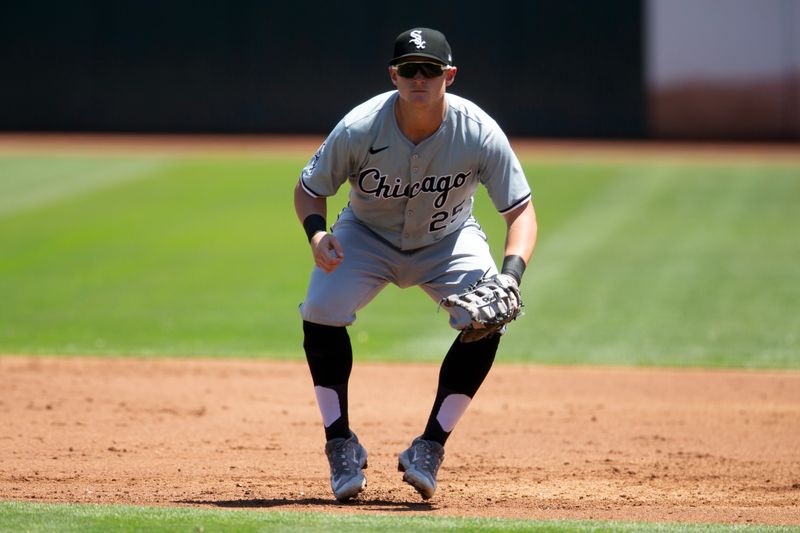 Aug 7, 2024; Oakland, California, USA; Chicago White Sox first baseman Andrew Vaughn (25) readies himself for the next pitch during the second inning against the Oakland Athletics at Oakland-Alameda County Coliseum. Mandatory Credit: D. Ross Cameron-USA TODAY Sports