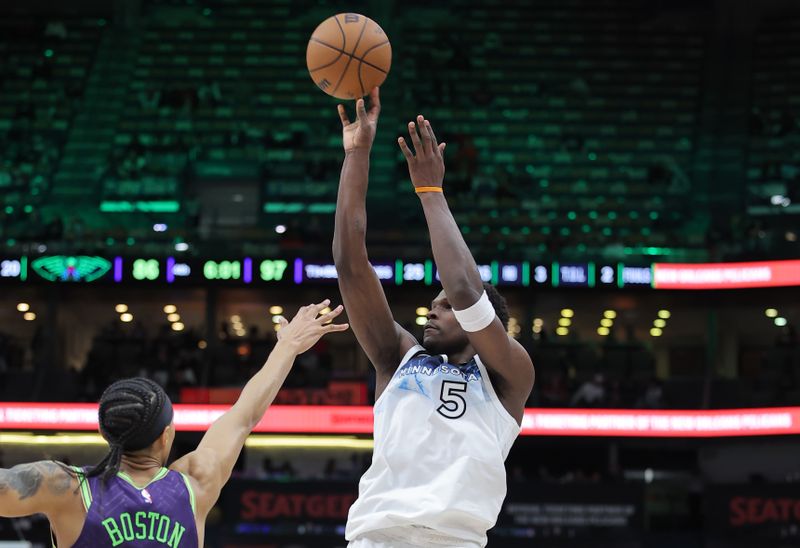 NEW ORLEANS, LOUISIANA - JANUARY 07: Anthony Edwards #5 of the Minnesota Timberwolves shoots over Brandon Boston #11 of the New Orleans Pelicans during the second half at the Smoothie King Center on January 07, 2025 in New Orleans, Louisiana. NOTE TO USER: User expressly acknowledges and agrees that, by downloading and or using this Photograph, user is consenting to the terms and conditions of the Getty Images License Agreement. (Photo by Jonathan Bachman/Getty Images)