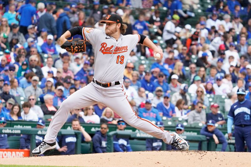 Jun 16, 2023; Chicago, Illinois, USA; Baltimore Orioles starting pitcher Cole Irvin (19) throws the ball against the Chicago Cubs during the first inning at Wrigley Field. Mandatory Credit: David Banks-USA TODAY Sports