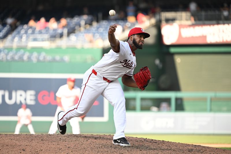 Jul 8, 2024; Washington, District of Columbia, USA; Washington Nationals starting pitcher Joan Adon (60) throws a pitch against the St. Louis Cardinals during the ninth inning at Nationals Park. Mandatory Credit: Rafael Suanes-USA TODAY Sports