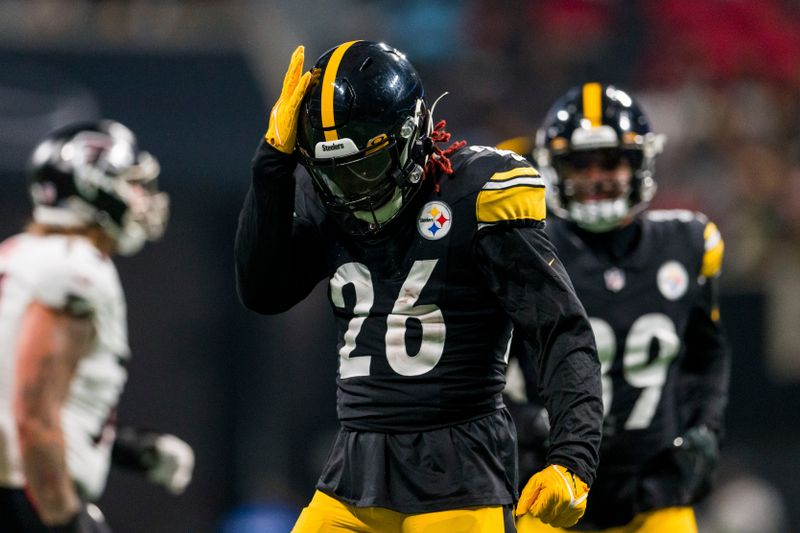 Pittsburgh Steelers linebacker Kwon Alexander (26) celebrates during the first half of an NFL preseason football game against the Atlanta Falcons, Thursday, Aug. 24, 2023, in Atlanta. The Pittsburgh Steelers won 24-0. (AP Photo/Danny Karnik)