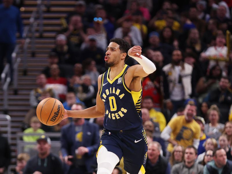 INDIANAPOLIS, IN - FEBRUARY 24: Tyrese Haliburton #0 of the Indiana Pacers looks to pass the ball during the game  against the Denver Nuggets on February 24, 2025 at Gainbridge Fieldhouse in Indianapolis, Indiana. NOTE TO USER: User expressly acknowledges and agrees that, by downloading and or using this Photograph, user is consenting to the terms and conditions of the Getty Images License Agreement. Mandatory Copyright Notice: Copyright 2025 NBAE (Photo by Pepper Robinson/NBAE via Getty Images)