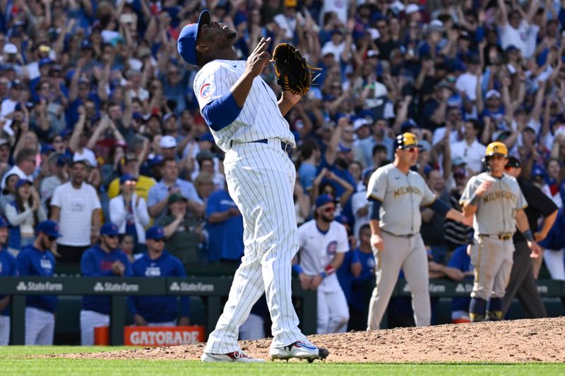 May 4, 2024; Chicago, Illinois, USA; Chicago Cubs pitcher Héctor Neris (51) reacts after beating the Milwaukee Brewers  at Wrigley Field. Mandatory Credit: Matt Marton-USA TODAY Sports