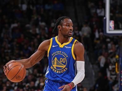 DENVER, CO - DECEMBER 25: Jonathan Kuminga #00 of the Golden State Warriors looks on during the game against the Denver Nuggets on December 25, 2023 at the Ball Arena in Denver, Colorado. NOTE TO USER: User expressly acknowledges and agrees that, by downloading and/or using this Photograph, user is consenting to the terms and conditions of the Getty Images License Agreement. Mandatory Copyright Notice: Copyright 2023 NBAE (Photo by Bart Young/NBAE via Getty Images)