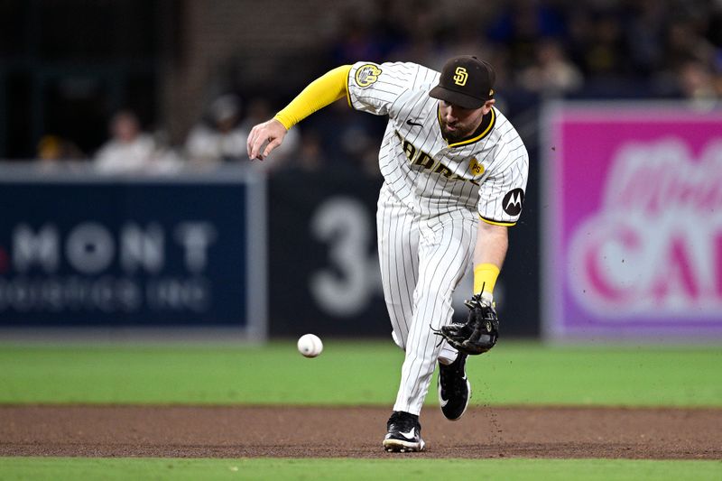 Aug 24, 2024; San Diego, California, USA; San Diego Padres shortstop Mason McCoy (18) fields a ground ball during the eighth inning against the New York Mets at Petco Park. Mandatory Credit: Orlando Ramirez-USA TODAY Sports