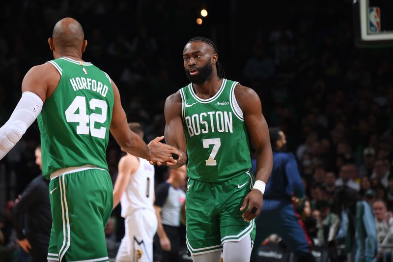 BOSTON, MA - MARCH 2: Al Horford #42 and Jaylen Brown #7 of the Boston Celtics high five during the game against the Denver Nuggets on March 2, 2025 at TD Garden in Boston, Massachusetts. NOTE TO USER: User expressly acknowledges and agrees that, by downloading and/or using this Photograph, user is consenting to the terms and conditions of the Getty Images License Agreement. Mandatory Copyright Notice: Copyright 2025 NBAE (Photo by Brian Babineau/NBAE via Getty Images)