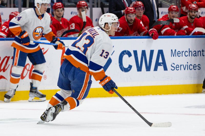 Oct 30, 2023; Elmont, New York, USA; New York Islanders center Mathew Barzal (13) controls the puck against the Detroit Red Wings during the third period at UBS Arena. Mandatory Credit: Thomas Salus-USA TODAY Sports