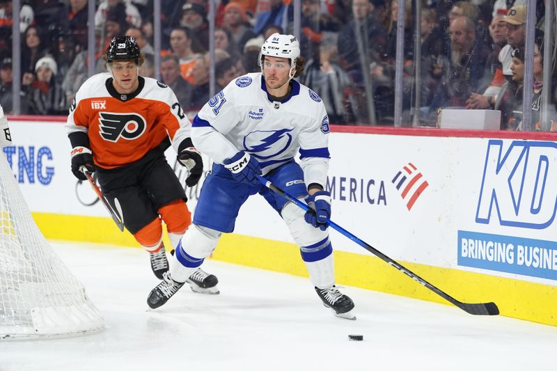 Jan 12, 2026; Philadelphia, Pennsylvania, USA; Tampa Bay Lightning defenseman Charle-Edouard D'Astous (51) controls the puck against the Philadelphia Flyers in the first period at Xfinity Mobile Arena. Mandatory Credit: Kyle Ross-Imagn Images