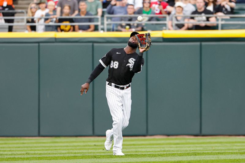 Aug 26, 2023; Chicago, Illinois, USA; Chicago White Sox center fielder Luis Robert Jr. (88) makes a catch /against the Oakland Athletics during the first inning at Guaranteed Rate Field. Mandatory Credit: Kamil Krzaczynski-USA TODAY Sports