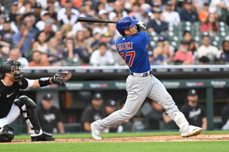 Aug 21, 2023; Detroit, Michigan, USA; Chicago Cubs right fielder Seiya Suzuki (27) hits a solo home run against the Detroit Tigers in the fourth inning at Comerica Park. Mandatory Credit: Lon Horwedel-USA TODAY Sports