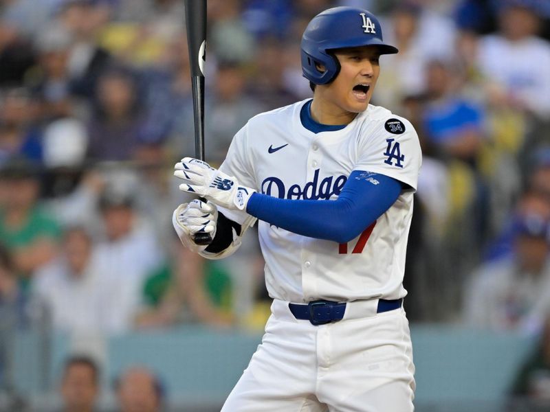 May 15, 2025; Los Angeles, California, USA; Los Angeles Dodgers designated hitter Shohei Ohtani (17) reacts to striking out against the Athletics during the first inning of the game at Dodger Stadium. Mandatory Credit: Jayne Kamin-Oncea-Imagn Images