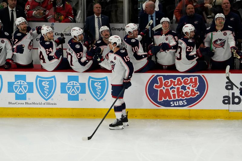 Dec 1, 2024; Chicago, Illinois, USA; Columbus Blue Jackets defenseman Dante Fabbro (15) celebrates his goal against the Chicago Blackhawks during the third period at United Center. Mandatory Credit: David Banks-Imagn Images