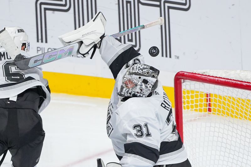 Nov 5, 2024; Saint Paul, Minnesota, USA; Los Angeles Kings goaltender David Rittich (31) makes a save against the Minnesota Wild in the third period at Xcel Energy Center. Mandatory Credit: Brad Rempel-Imagn Images