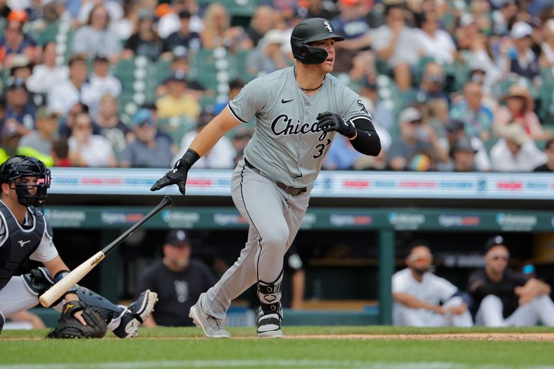 Jun 23, 2024; Detroit, Michigan, USA;  Chicago White Sox right fielder Gavin Sheets (32) hits a double in the seventh inning against the Detroit Tigers at Comerica Park. Mandatory Credit: Rick Osentoski-USA TODAY Sports