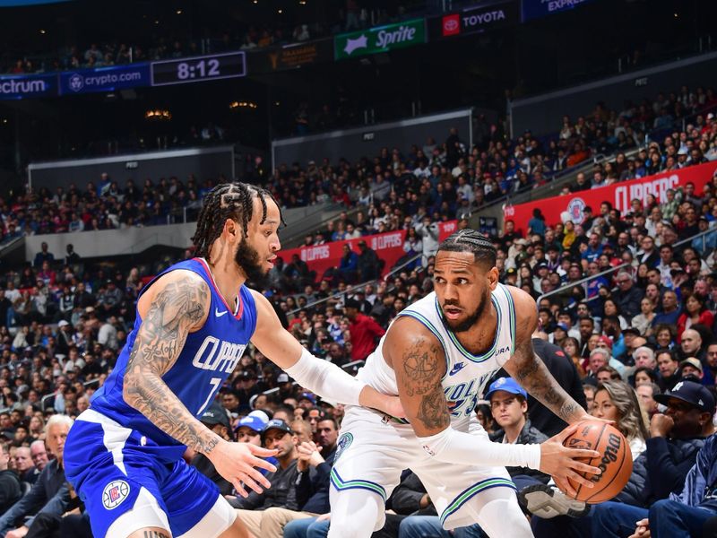 LOS ANGELES, CA - FEBRUARY 12:  Monte Morris #23 of the of the Minnesota Timberwolves handles the ball during the game  n February 12, 2024 at Crypto.Com Arena in Los Angeles, California. NOTE TO USER: User expressly acknowledges and agrees that, by downloading and/or using this Photograph, user is consenting to the terms and conditions of the Getty Images License Agreement. Mandatory Copyright Notice: Copyright 2024 NBAE (Photo by Adam Pantozzi/NBAE via Getty Images)