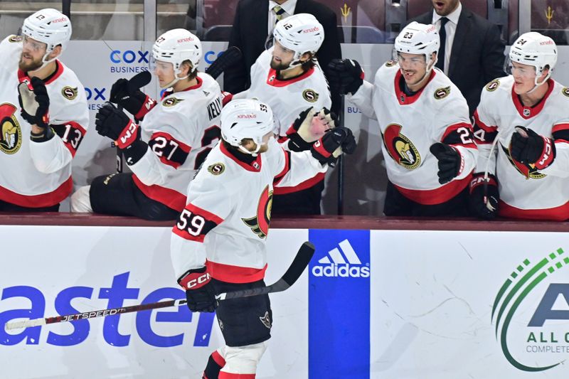 Dec 19, 2023; Tempe, Arizona, USA; Ottawa Senators left wing Angus Crookshank (59) celebrates with teammates after scoring a goal in the first period against the Arizona Coyotes at Mullett Arena. Mandatory Credit: Matt Kartozian-USA TODAY Sports