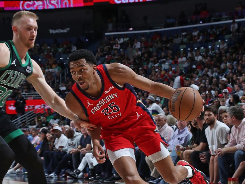 NEW ORLEANS, LA - MARCH 30: Trey Murphy III #25 of the New Orleans Pelicans handles the ball during the game against the Boston Celtics on March 30, 2024 at the Smoothie King Center in New Orleans, Louisiana. NOTE TO USER: User expressly acknowledges and agrees that, by downloading and or using this Photograph, user is consenting to the terms and conditions of the Getty Images License Agreement. Mandatory Copyright Notice: Copyright 2024 NBAE (Photo by Layne Murdoch Jr./NBAE via Getty Images)