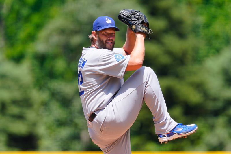 Jun 26, 2025; Denver, Colorado, USA; Los Angeles Dodgers starting pitcher Clayton Kershaw (22) prepares to deliver a pitch in the first inning against the Colorado Rockies at Coors Field. Mandatory Credit: Ron Chenoy-Imagn Images