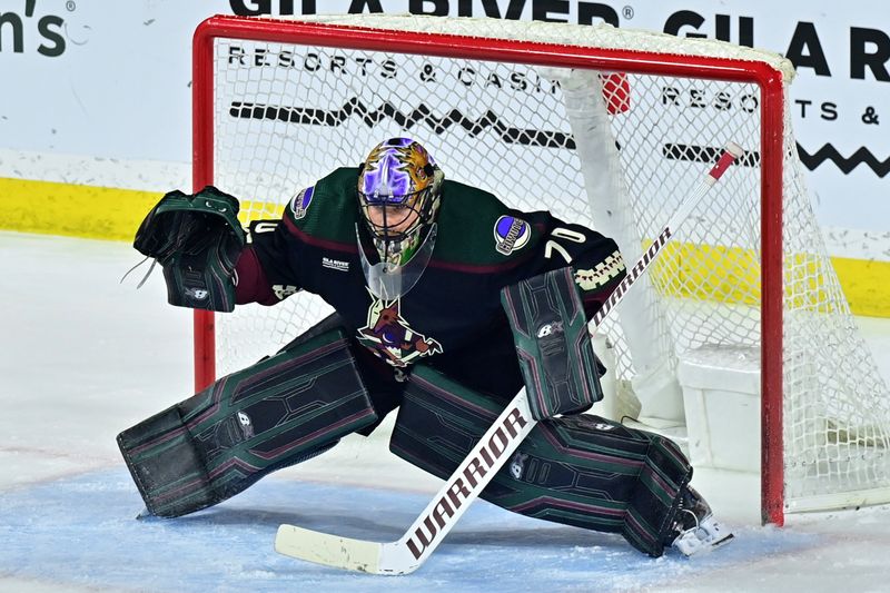 Mar 27, 2023; Tempe, Arizona, USA;  Arizona Coyotes goaltender Karel Vejmelka (70) defends in the second period against the Edmonton Oilers at Mullett Arena. Mandatory Credit: Matt Kartozian-USA TODAY Sports