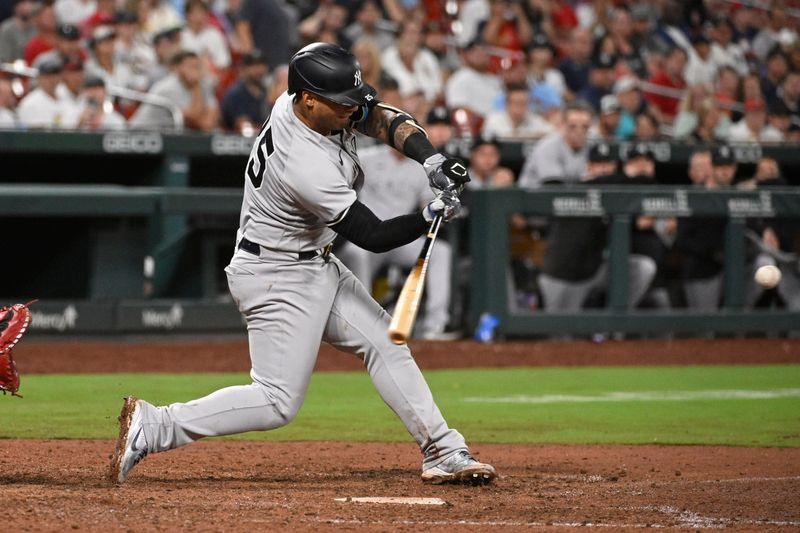 Jul 1, 2023; St. Louis, Missouri, USA; New York Yankees second baseman Gleyber Torres (25) hits a two-run single against the St. Louis Cardinals in the eighth inning in game two of a double header at Busch Stadium. Mandatory Credit: Joe Puetz-USA TODAY Sports