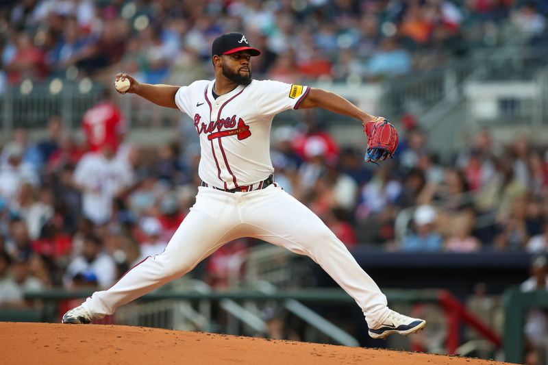 Jul 2, 2024; Atlanta, Georgia, USA; Atlanta Braves starting pitcher Reynaldo Lopez (40) throws against the San Francisco Giants in the third inning at Truist Park. Mandatory Credit: Brett Davis-USA TODAY Sports