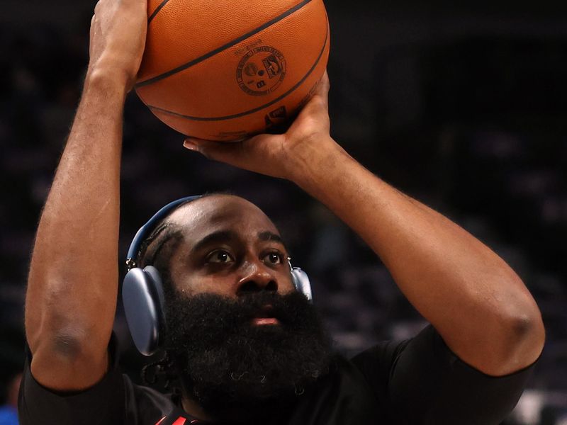 DALLAS, TEXAS - NOVEMBER 10: James Harden #1 of the LA Clippers warms up before the game against the Dallas Mavericks at American Airlines Center on November 10, 2023 in Dallas, Texas. NOTE TO USER: User expressly acknowledges and agrees that, by downloading and or using this photograph, User is consenting to the terms and conditions of the Getty Images License Agreement. (Photo by Richard Rodriguez/Getty Images)