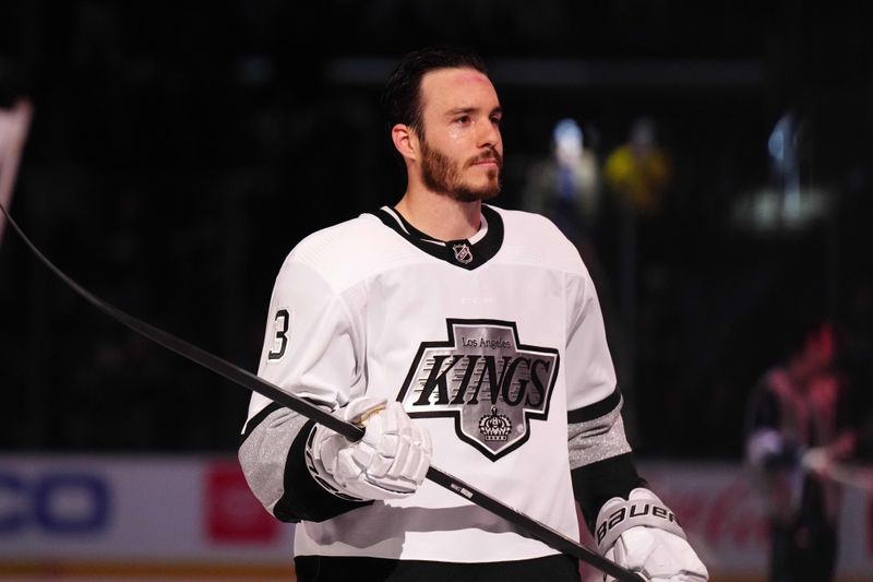 Apr 13, 2024; Los Angeles, California, USA; LA Kings defenseman Matt Roy (3) is recognized as the first star of the night after the game against the Anaheim Ducks at Crypto.com Arena. Mandatory Credit: Kirby Lee-USA TODAY Sports