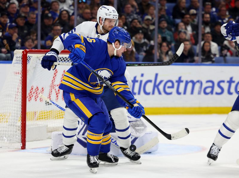 Mar 14, 2026; Buffalo, New York, USA;  Buffalo Sabres left wing Zach Benson (6) tries to deflect a shot on goal during the second period against the Toronto Maple Leafs at KeyBank Center. Mandatory Credit: Timothy T. Ludwig-Imagn Images