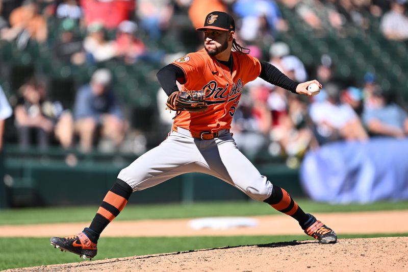 May 25, 2024; Chicago, Illinois, USA;  Baltimore Orioles pitcher Cionel Perez (58) pitches in the ninth inning against the Chicago White Sox at Guaranteed Rate Field. Mandatory Credit: Jamie Sabau-USA TODAY Sports