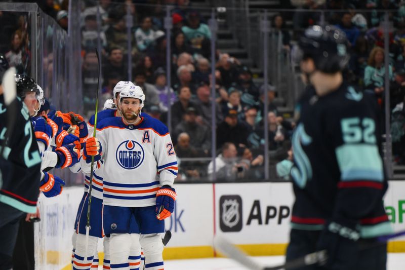 Mar 2, 2024; Seattle, Washington, USA; Edmonton Oilers center Leon Draisaitl (29) celebrates with the bench after scoring a goal against the Seattle Kraken during the second period at Climate Pledge Arena. Mandatory Credit: Steven Bisig-USA TODAY Sports