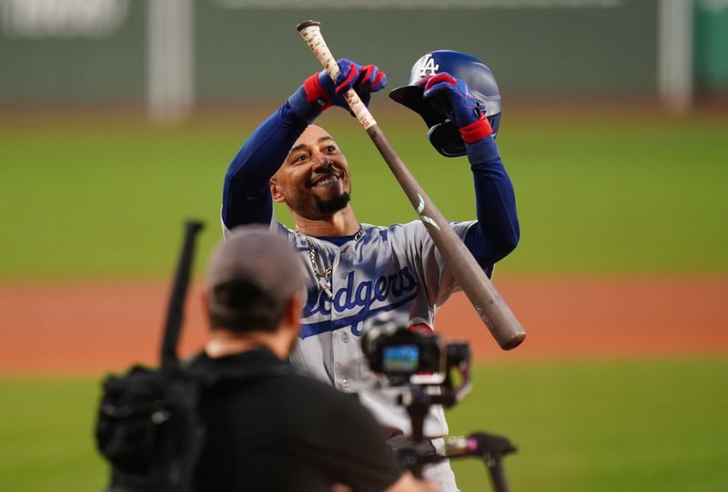 Aug 25, 2023; Boston, Massachusetts, USA; Los Angeles Dodgers right fielder Mookie Betts (50) reacts to the crowd before batting against the Boston Red Sox in the first inning at Fenway Park. Mandatory Credit: David Butler II-USA TODAY Sports