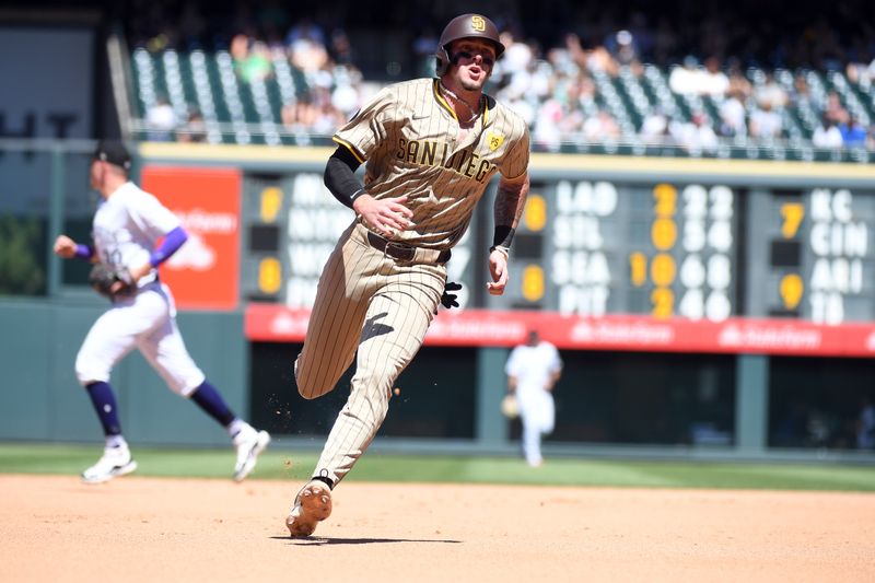 Aug 18, 2024; Denver, Colorado, USA; San Diego Padres outfielder Jackson Merrill (3) scores in the fourth inning against the Colorado Rockies at Coors Field. Mandatory Credit: Christopher Hanewinckel-USA TODAY Sports